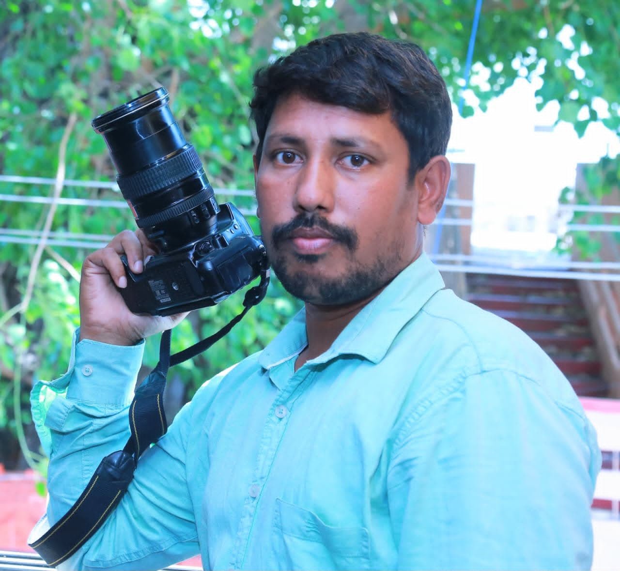 సాక్షి ఫోటోగ్రాఫర్ సతీష్ కు రాష్ట్రస్థాయి అవార్డు